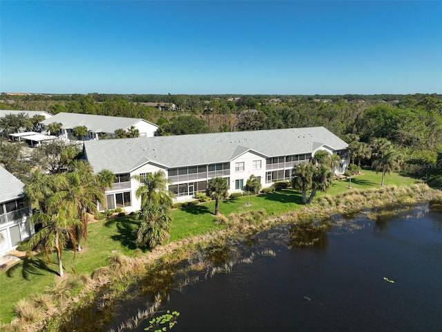 drone / aerial view with a water view