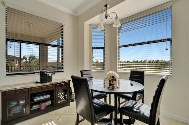 dining area featuring light tile patterned flooring and crown molding