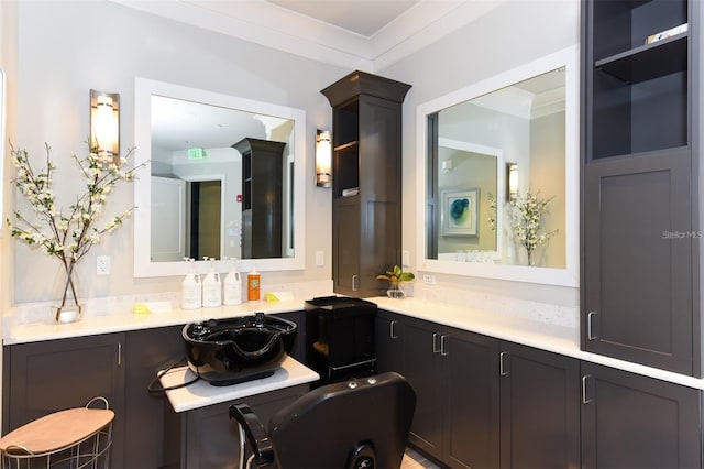 bathroom featuring vanity and crown molding