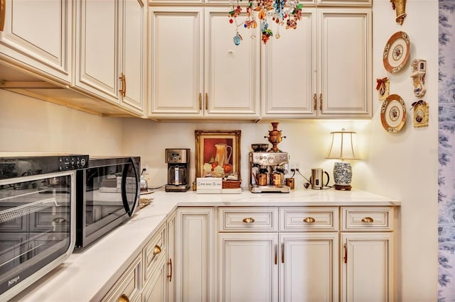 kitchen featuring cream cabinets