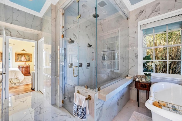 bathroom with separate shower and tub and ornamental molding