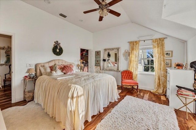 bedroom with wood-type flooring, vaulted ceiling, and ceiling fan