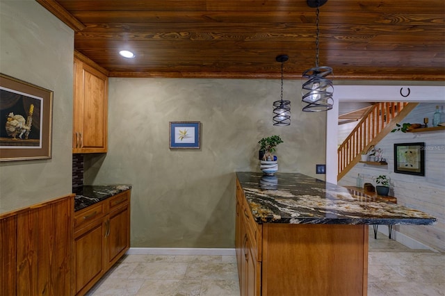 bar with dark stone countertops, wood ceiling, and decorative light fixtures