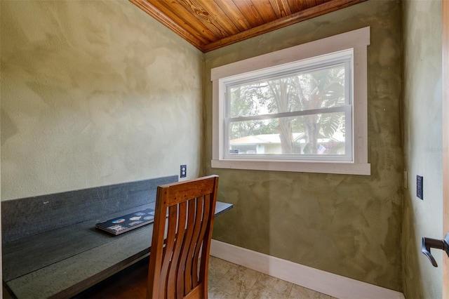 dining room with wooden ceiling and ornamental molding