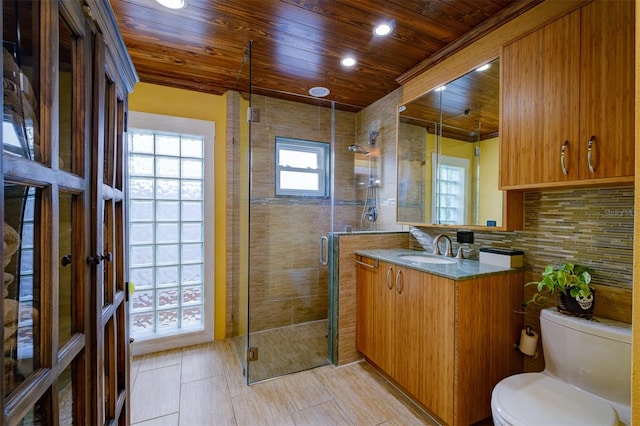 bathroom featuring backsplash, an enclosed shower, vanity, wooden ceiling, and toilet