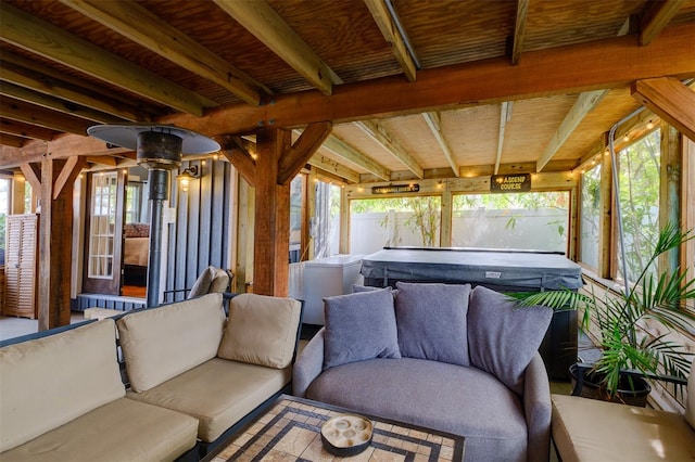 view of patio / terrace with a hot tub