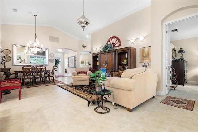 tiled living room with crown molding, high vaulted ceiling, and a notable chandelier