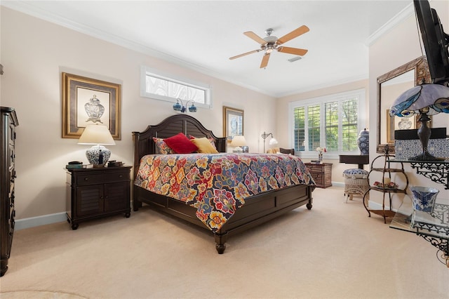 bedroom with ceiling fan, light colored carpet, and ornamental molding