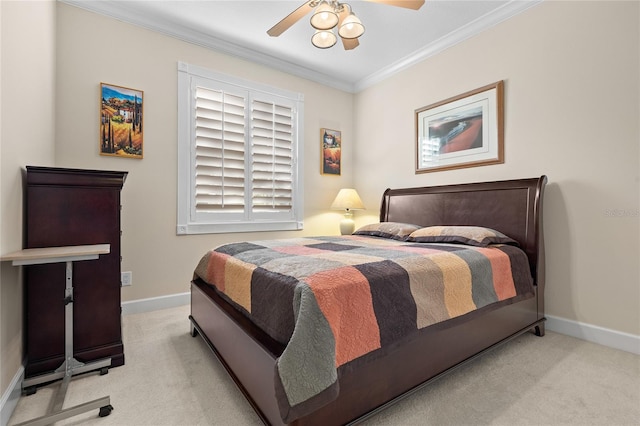 bedroom featuring ceiling fan, light carpet, and ornamental molding