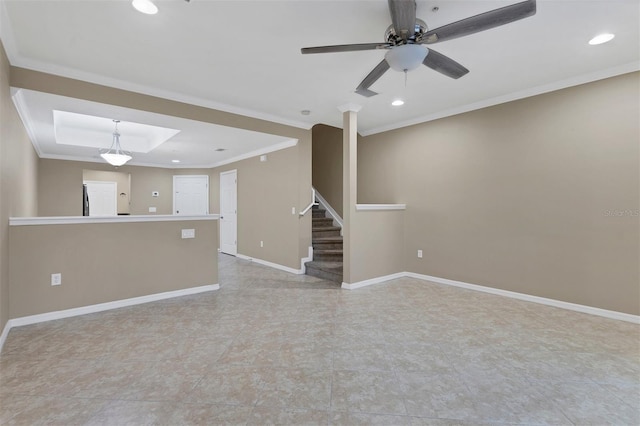 unfurnished living room with ceiling fan and ornamental molding