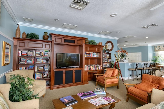 carpeted living room with a textured ceiling and crown molding