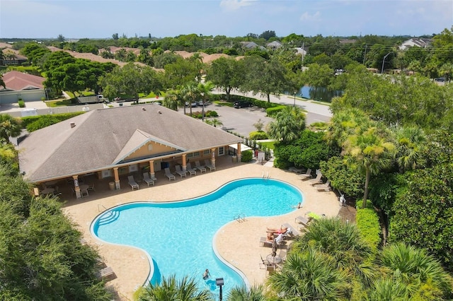 view of swimming pool featuring a patio area