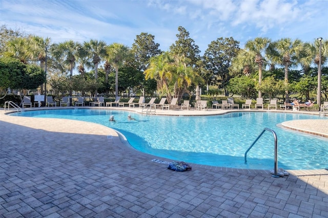 view of pool featuring a patio area