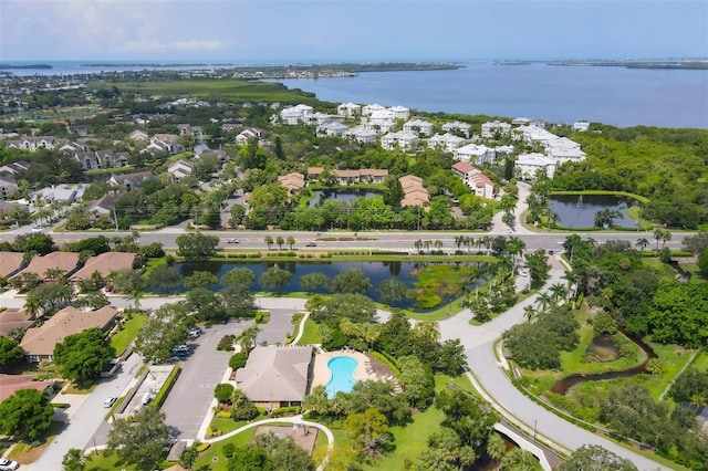 drone / aerial view with a water view