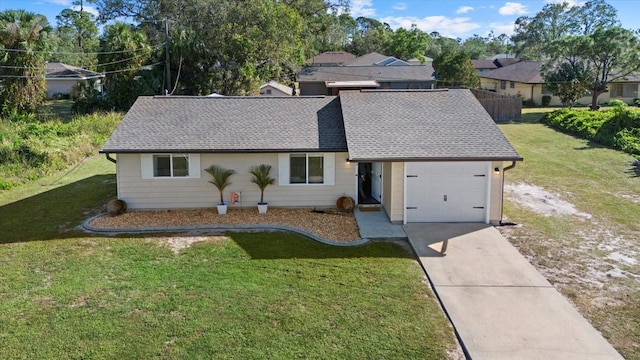 single story home with a front yard and a garage