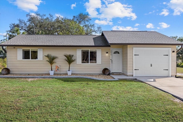 single story home featuring a front yard and a garage