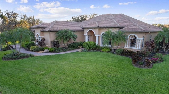 view of front of home with a front yard