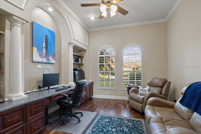 home office with dark hardwood / wood-style flooring, decorative columns, ceiling fan, and ornamental molding