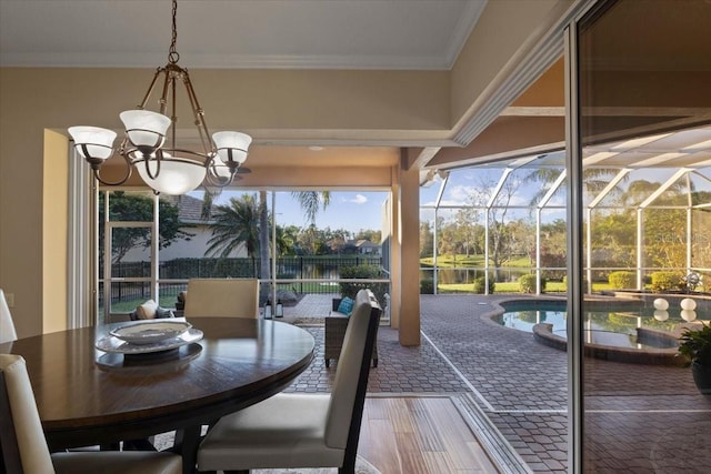 sunroom / solarium featuring a swimming pool and an inviting chandelier