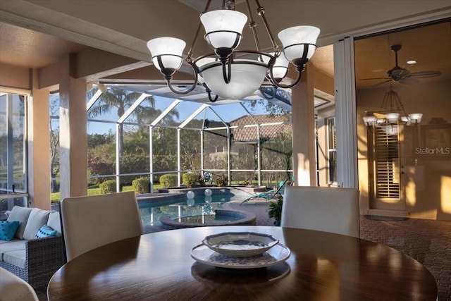 dining room with ceiling fan and a healthy amount of sunlight