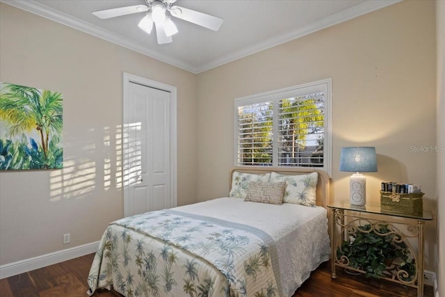 bedroom featuring ceiling fan, dark hardwood / wood-style flooring, and ornamental molding