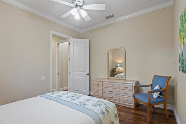 bedroom with ceiling fan, ornamental molding, and dark wood-type flooring