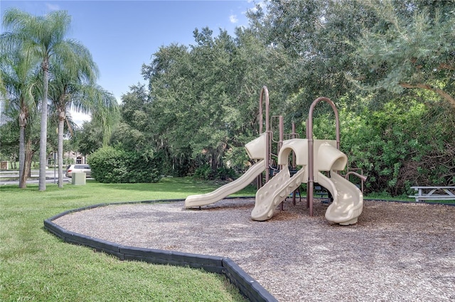 view of playground featuring a yard