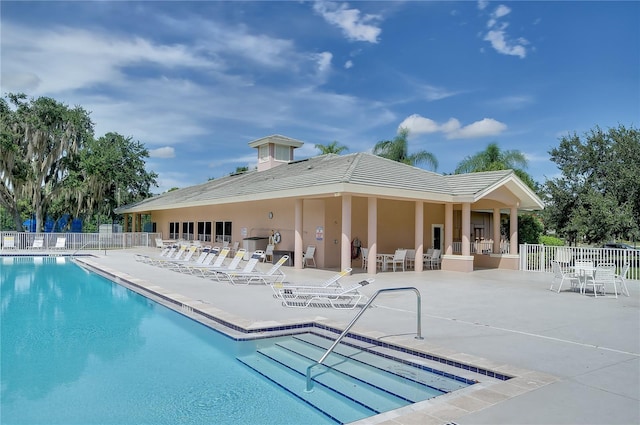 view of pool featuring a patio