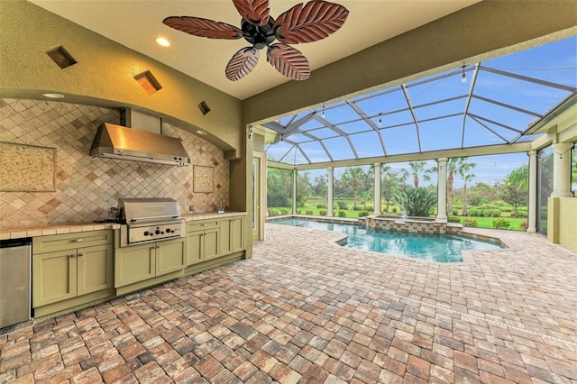 view of pool with an in ground hot tub, area for grilling, ceiling fan, and a lanai