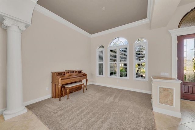 misc room featuring decorative columns, plenty of natural light, and ornamental molding