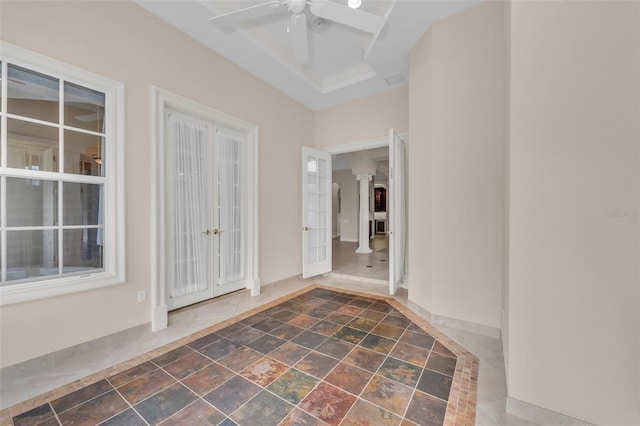 entryway featuring coffered ceiling, ceiling fan, and french doors