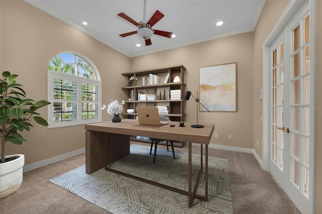 office space featuring carpet, french doors, ceiling fan, and ornamental molding