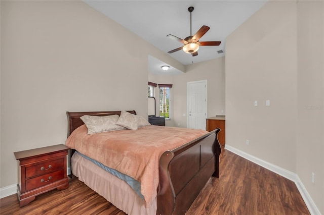 bedroom featuring ceiling fan and dark wood-type flooring