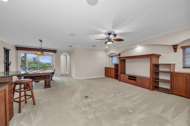 playroom with ceiling fan, light carpet, billiards, and ornamental molding