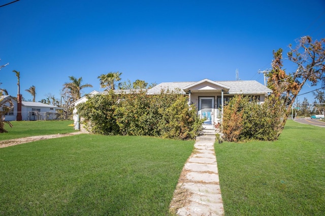 view of front of house with a front lawn