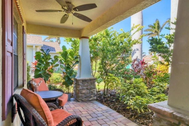 view of patio / terrace featuring ceiling fan