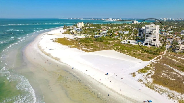 aerial view featuring a beach view and a water view