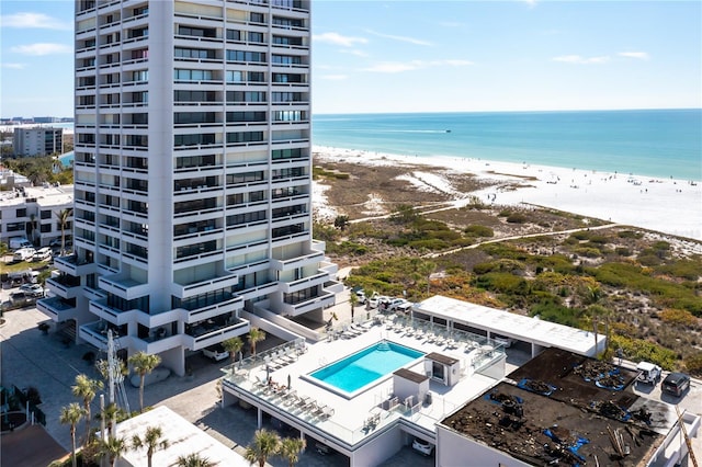 bird's eye view with a beach view and a water view