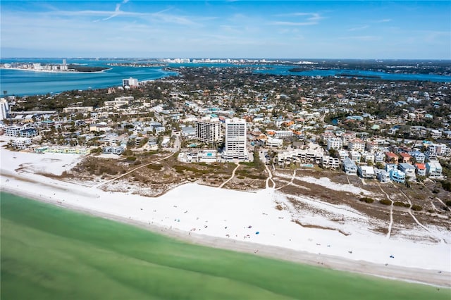 bird's eye view featuring a water view and a view of the beach