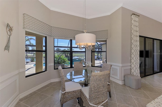 dining area featuring crown molding, tile patterned flooring, and a healthy amount of sunlight