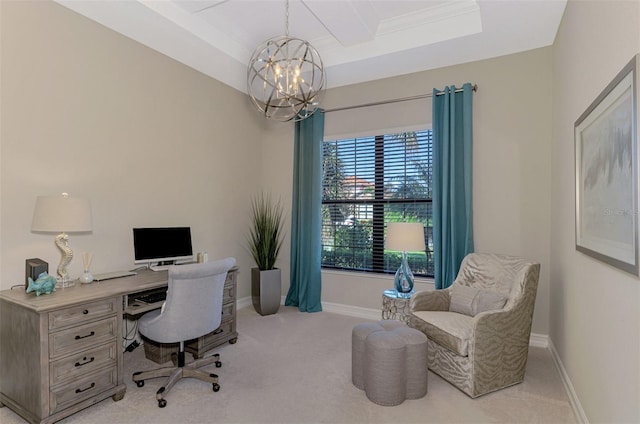 office space featuring a tray ceiling, light carpet, and a chandelier