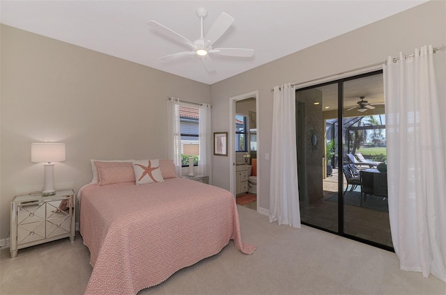 bedroom featuring access to exterior, light carpet, ensuite bathroom, and ceiling fan