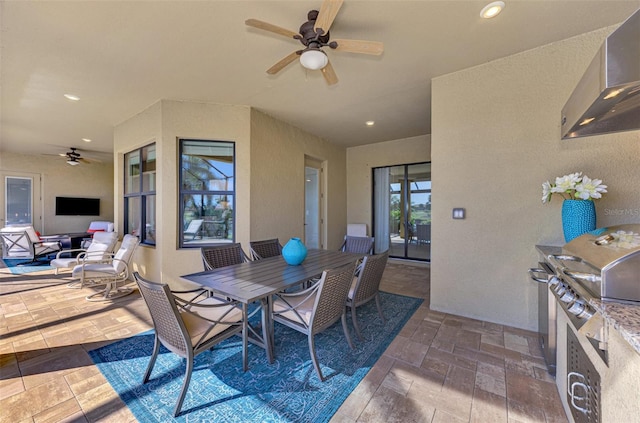 view of patio with a grill and ceiling fan