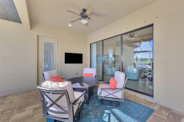 view of patio / terrace featuring ceiling fan