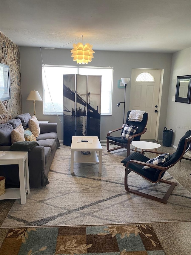1680 17th St, Sarasota, FL 34234 - living room featuring baseboards