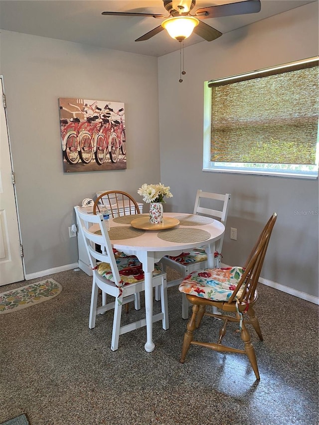 dining room with ceiling fan