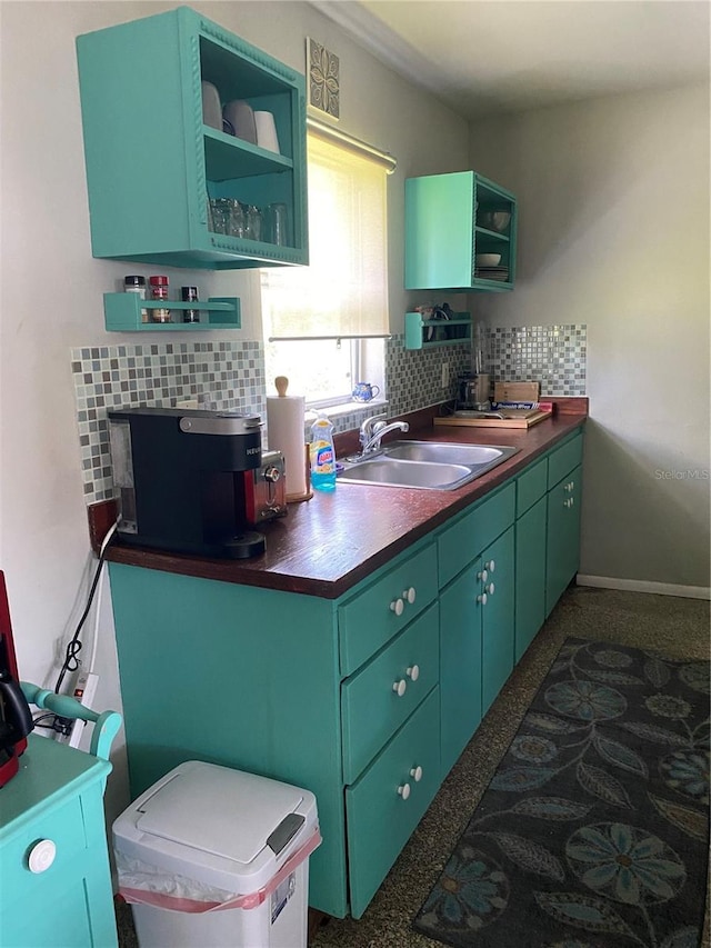 1680 17th St, Sarasota, FL 34234 - kitchen featuring backsplash, open shelves, green cabinets, and dark countertops