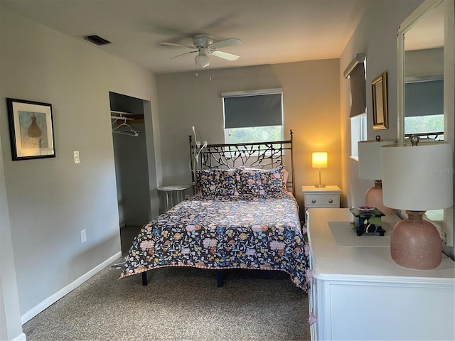 bedroom featuring ceiling fan, a closet, and carpet floors