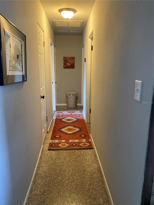 hall featuring carpet