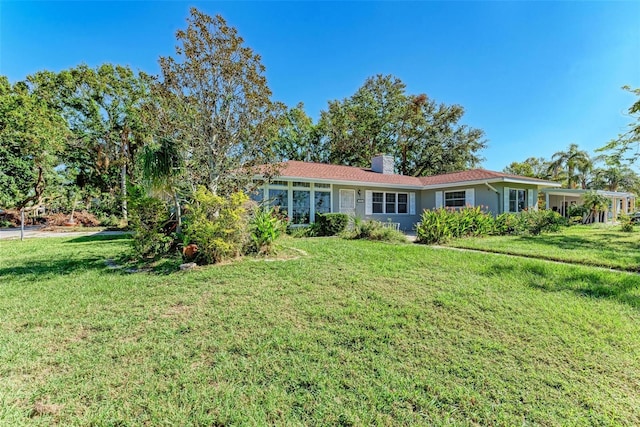 exterior space with a front yard